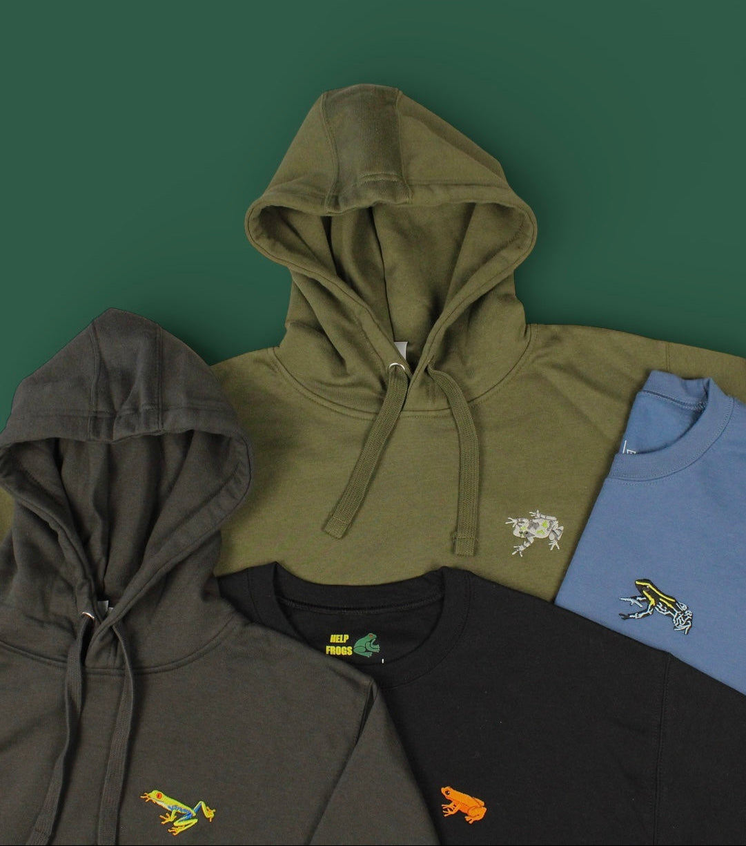 Four hoodies in different colors with embroidered logos on a green background